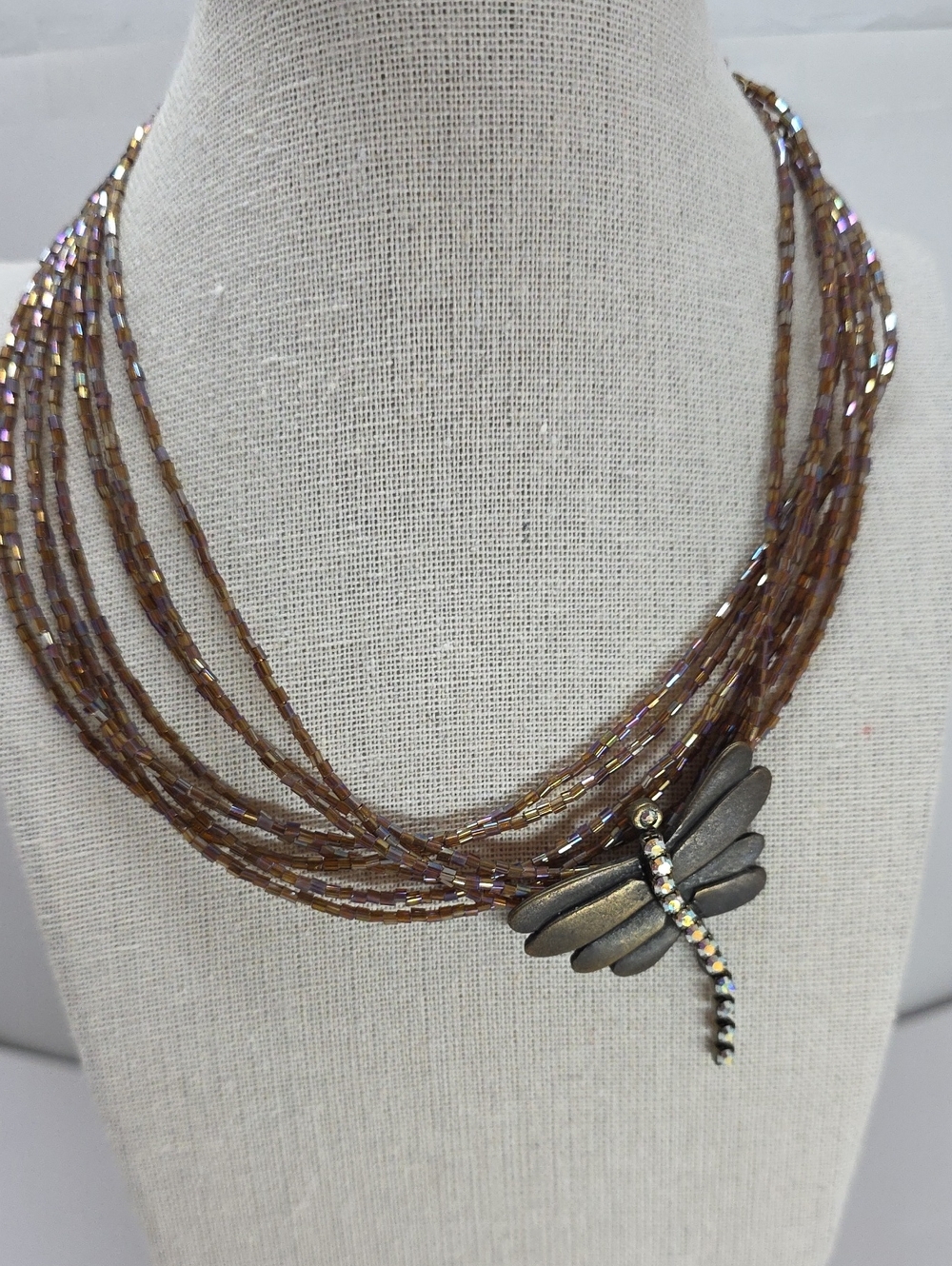 Multi-Strand Brown Beaded Necklace with Dragonfly Pendant